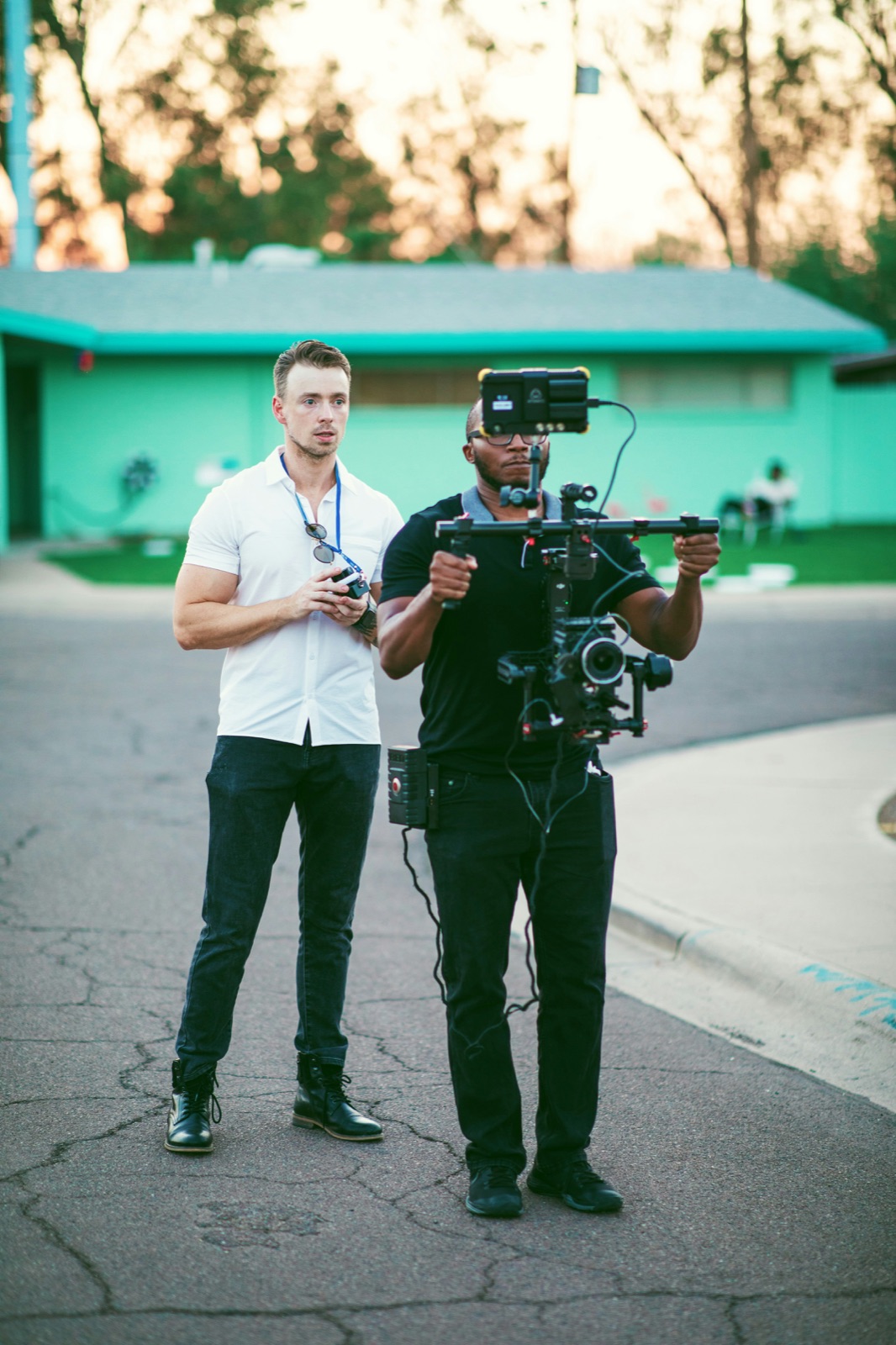 Director and gimbal operator filming on location