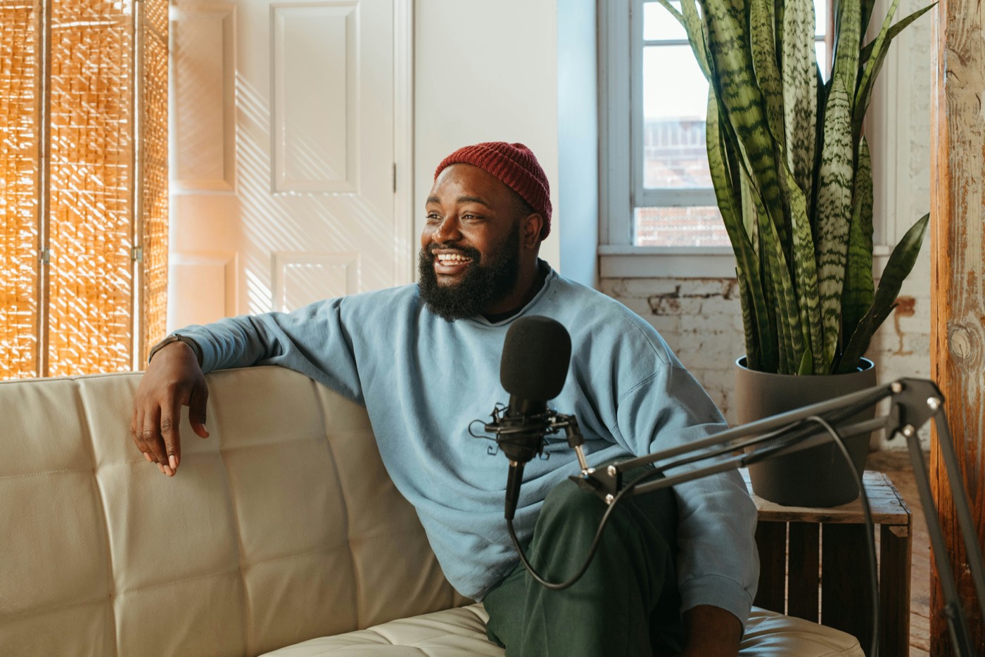 A podcast host mid-conversation, filmed on a phone
